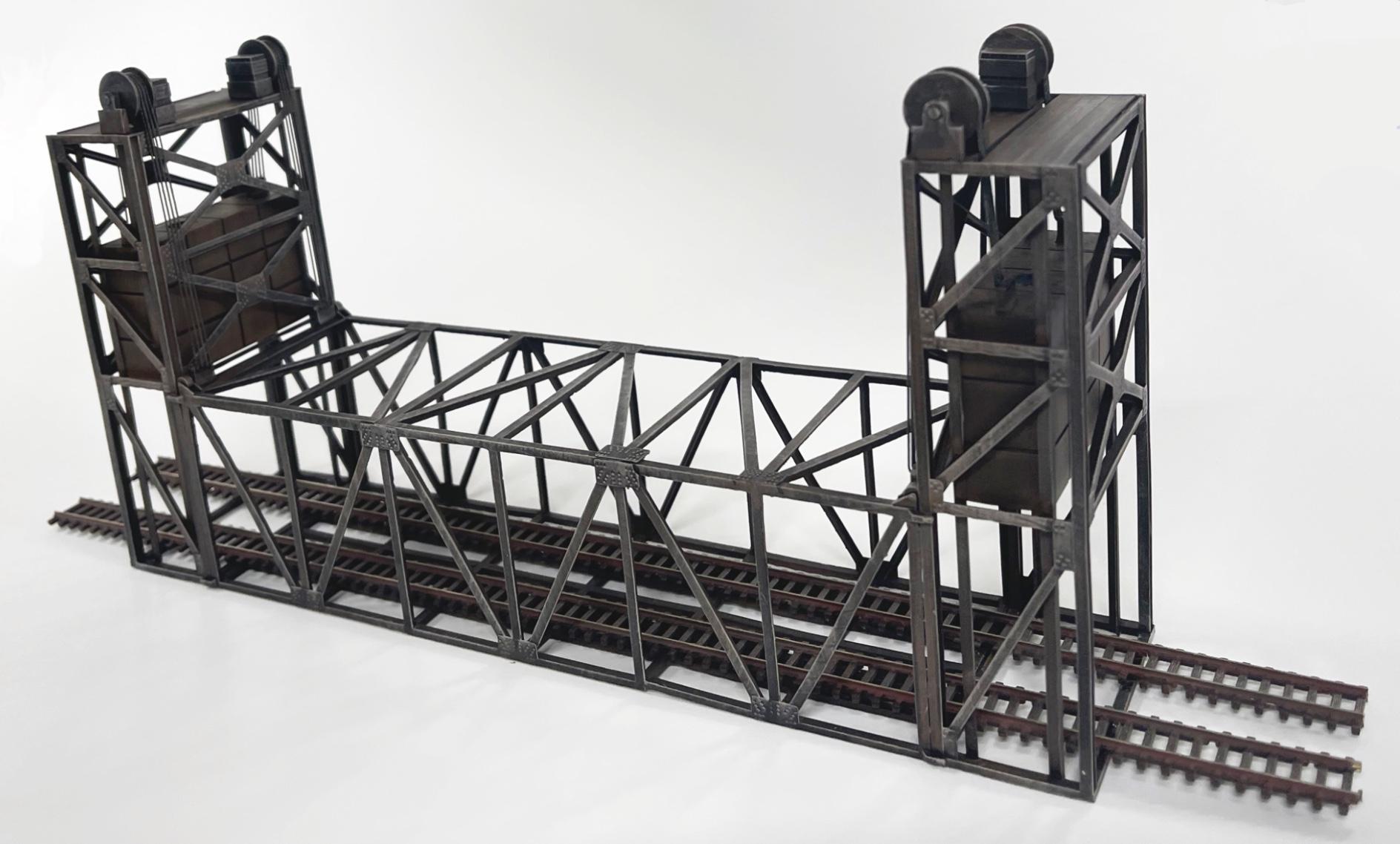Double Track, HO-Scale lift bridge with counterweights. Adjustable length.
